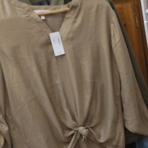 Chic Gold . Maurices Blouse with Front Knot. Size Small. Brand New. No holes .